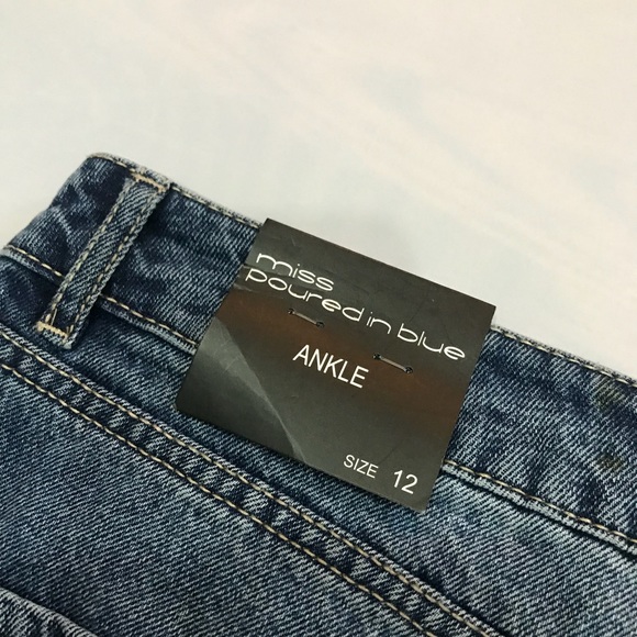 miss poured in blue jeans size 12